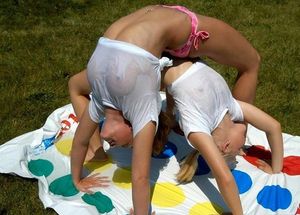 Twin gymnasts do back bends