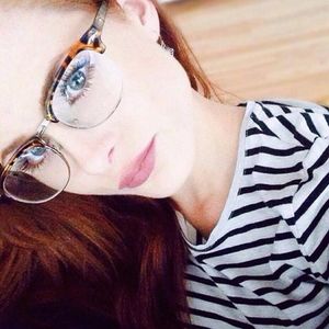 Redhead glasses babe