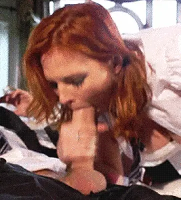 A hot redhead sucking a big dick