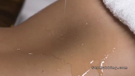 Tanned oiled teen has multiple orgasms