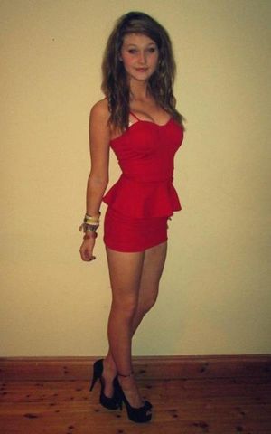 Sexy red dress beautifies the slim amateur