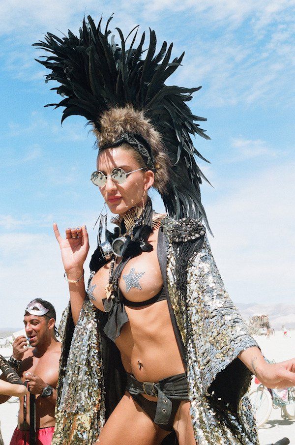 What a headdress and boobs on display at Burning Man 2017.