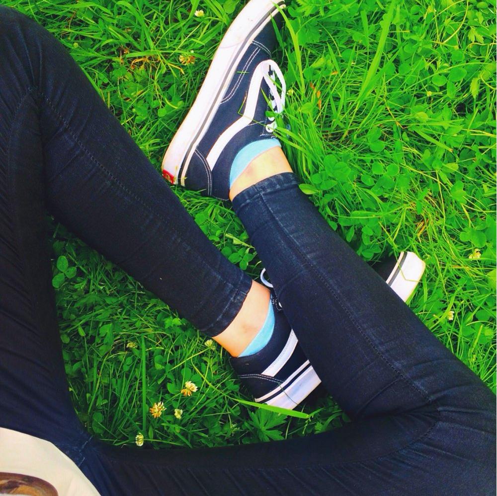 sitting on grass