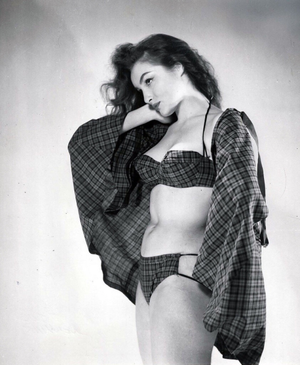 Julie Newmar in bathing suit.