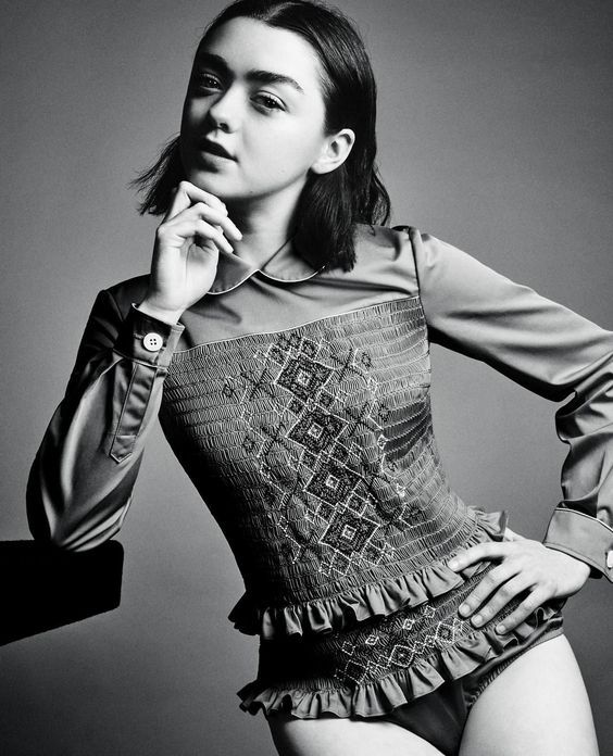 Darling Maisie looking thoughtful, classic, and sexy, half-dressed