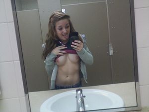 Self-shooting redheaded emo teen