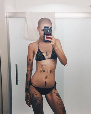 Short hair and tattoo