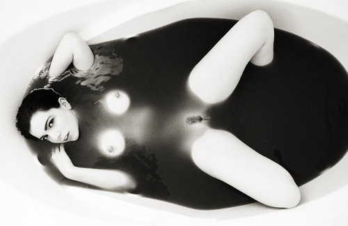 Floating in black water