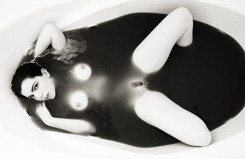 Floating in black water