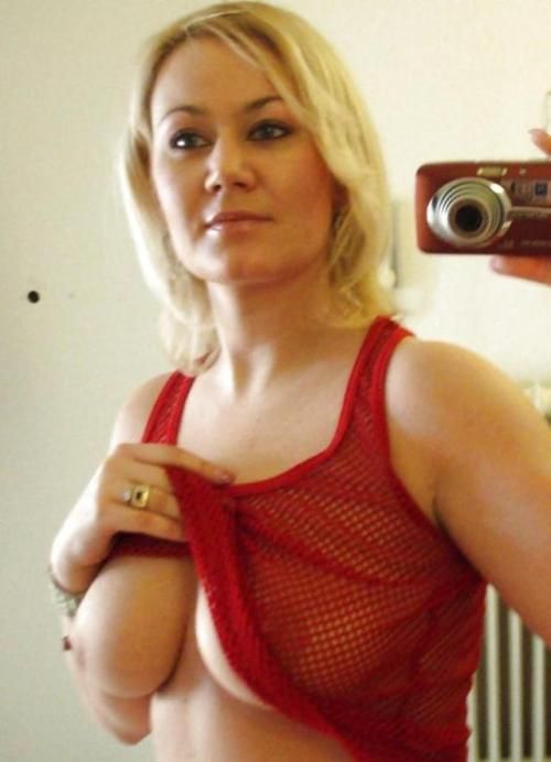 Beautiful Milf shows big boobs on mirror selfie