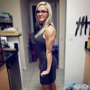 Sweet fit blonde wearing smart glasses