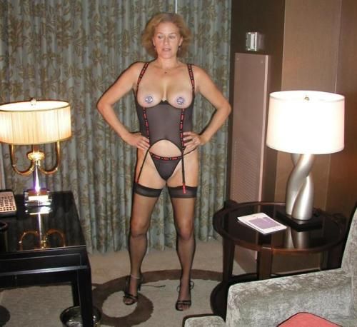 My wife is presented in black sensual underwear