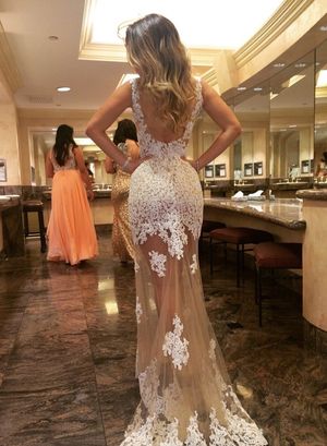 Bride showing perfect curves in weddingdress