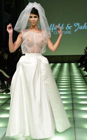 Bride wears essentially topless dress for wedding.