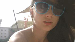 hot brunette sunbathing