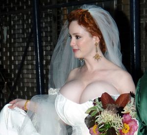 Christina Hendricks approaching the altar wearing her revealing wedding dress. A warning may have been issued by the astonished priest, who clearly mentioned that, unless the lady covered her sinful jumbo mammaries, he would have to suspend the...