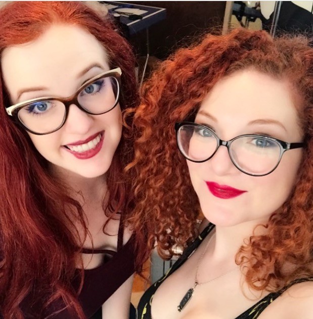 2 Redheads with glasses