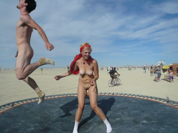 Nude fun on a trampoline at Burning Man