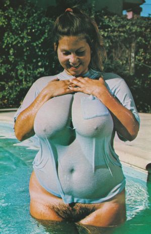 Hairy BBW with big naturals in swimming pool