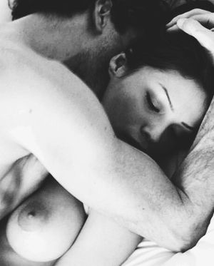 Breathing on her neck while she's hugging you naked