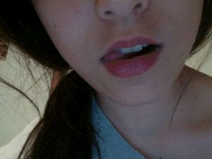 Sexy babe licking her perfect lips