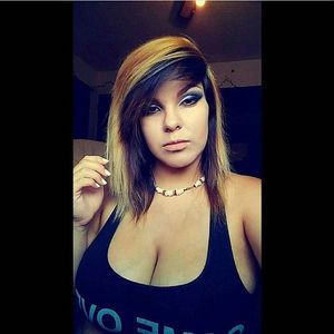 Emo showing massive boobs