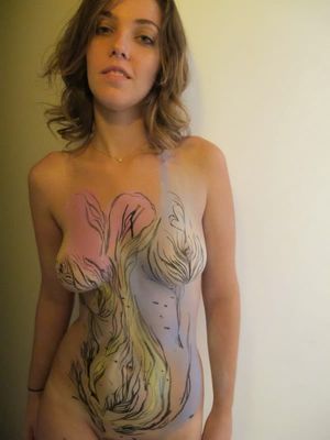 Cute blonde GF showing off her body paint tattoo