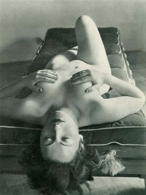 Recumbent Model photographed by Andre de Dienes (c. 1950)