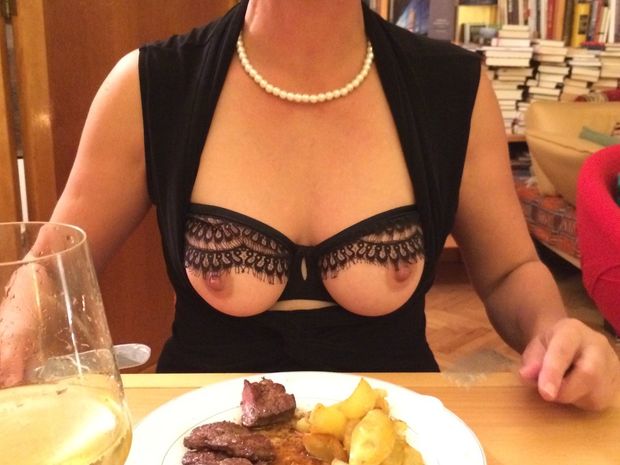MILF with her tits out at dinner