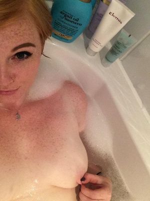 Beauty pinching her nips