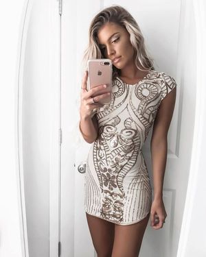 Super tight blonde in skintight dress