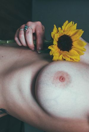 Sunflowers make me very happy….so do my adorable innie nipples.