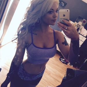 Blonde selfie in blue tanktop