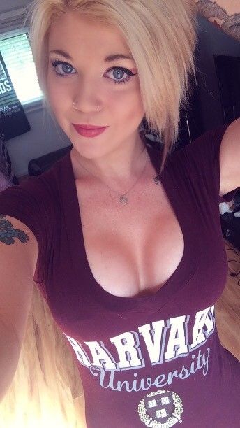 Blonde selfie in Harvard shirt