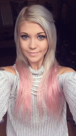 Blonde selfie in white shirt