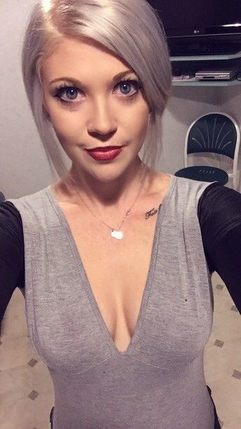 Blonde selfie in grey shirt