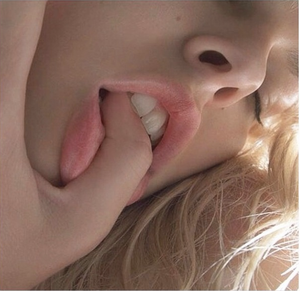 Sucking her thumb from the pleasure