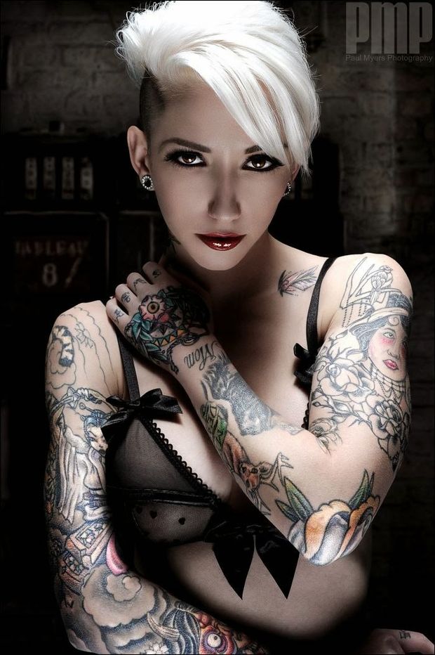 Dramatic Platinum Blonde with Two Tattoo Sleeves