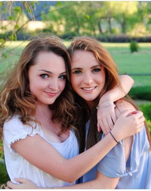 Bayley is looking sexy as hell with big boobs and cleavage with cute looking friend