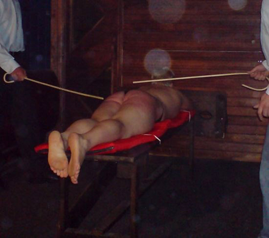 Caned by 2 masters !