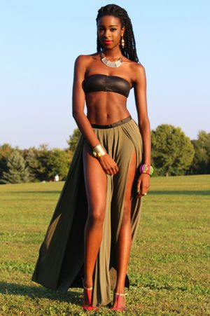 Ebony Babe in full-length skirt with mile high slits