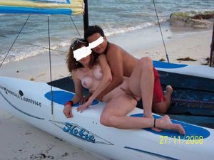 Beach wife naked, groped by a stranger