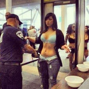 Hottie getting strip searched at the airport.