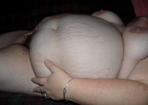 BBW laying nude on sofa