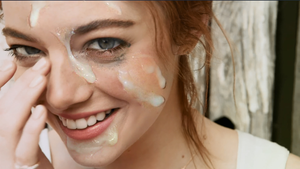 Smiling with cum in her face