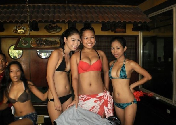 Sexy Filipina bargirls in Angeles City Philippines wearing skimpy bikinis