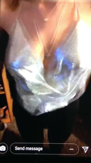 Sexy teen shaking her perky braless tits