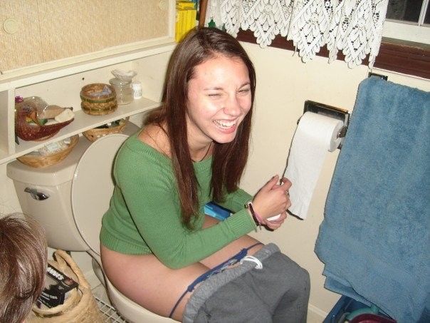 on toilet pissing