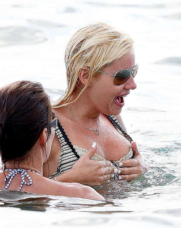 Elisha Cuthbert nipslip at the beach