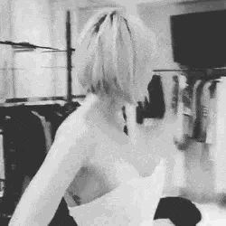 This bride pops out of her top and lets us peek at the goods.